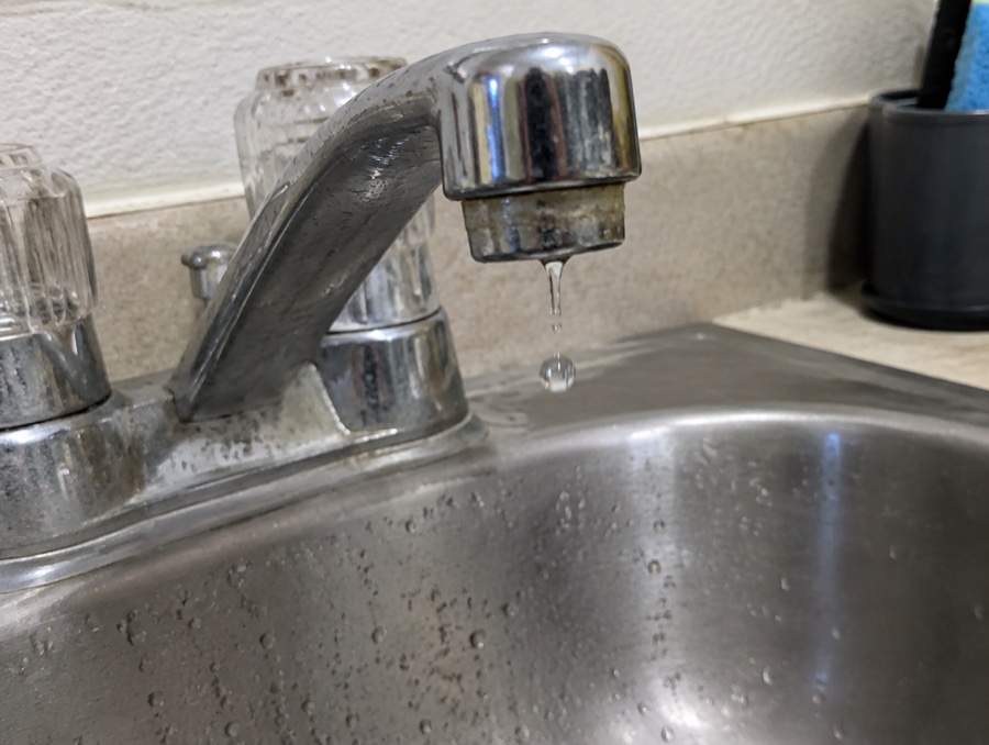 A dripping kitchen faucet
